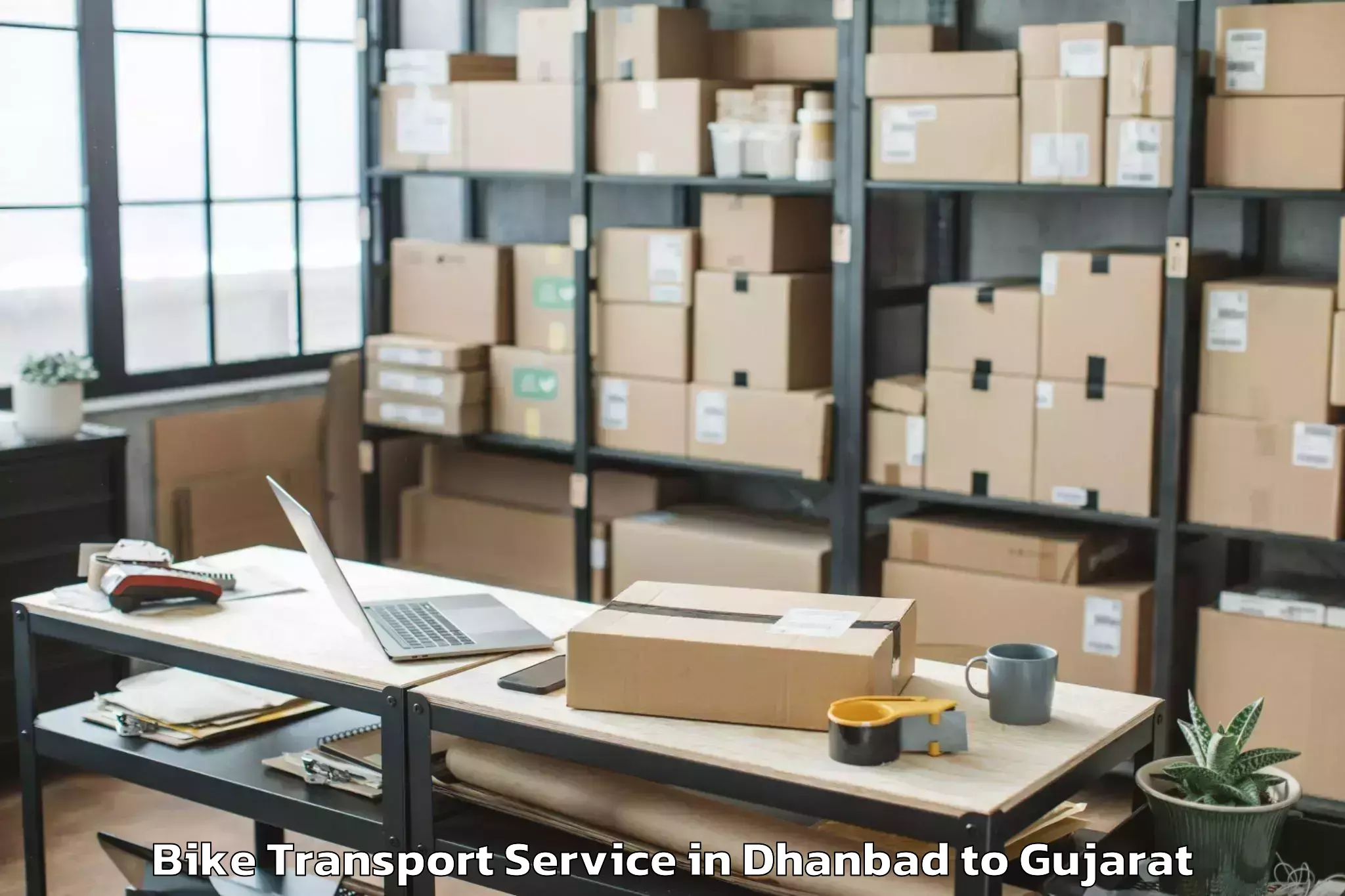 Professional Dhanbad to Gujarat Technological Universi Bike Transport